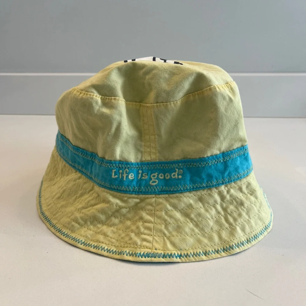 - Life is good reversible 100% cotton kids bucket hat yellow blue